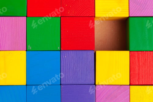 Preview: Colorful wooden blocks background, top view