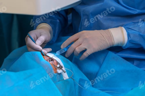 Preview: Surgeon Administering Injection During Eye Surgery Procedure