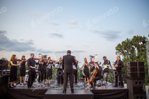 Preview: Musical ensemble playing classic instrumental music on the street