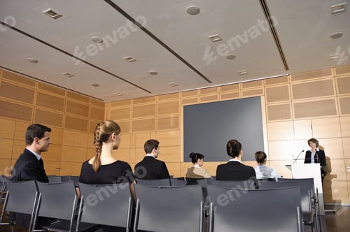 Preview: Business people in seminar