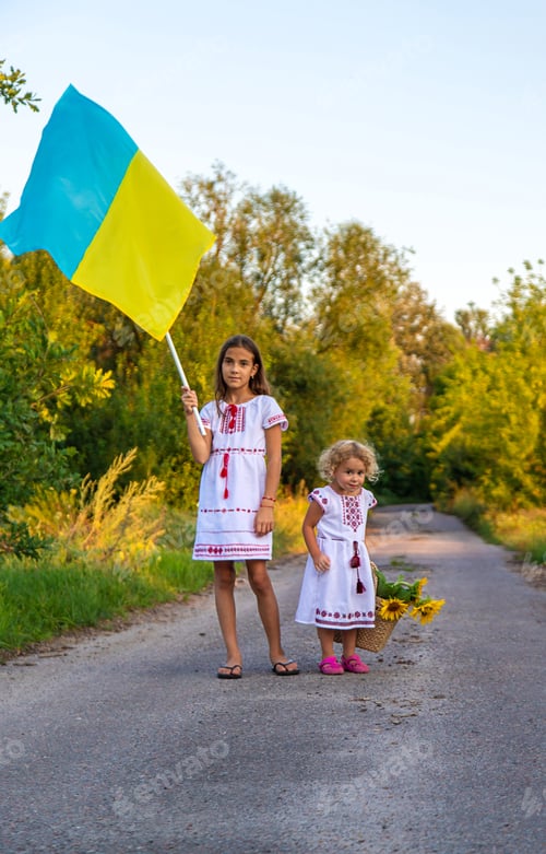 Preview: Child with the flag of Ukraine. Selective focus.