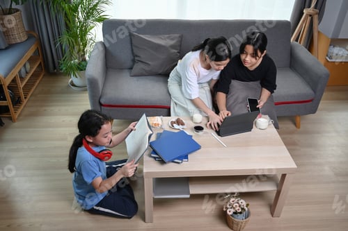 Preview: Three asian girl sitting in comfortable home and enjoy leisure weekend together.
