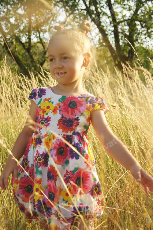 Preview: Beautiful little girl walking in the park
