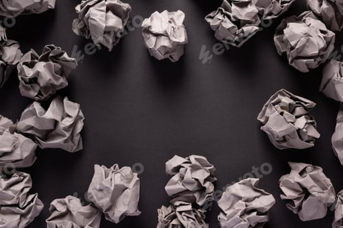 Preview: Crumpled paper balls on black background texture. Inspiration creative idea concept