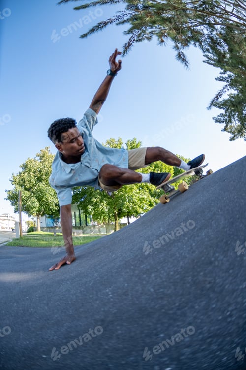 Preview: A fisheye view of a skateboarder carving a steep ramp