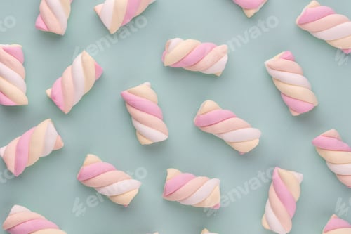 Preview: Colorful marshmallow laid out on pastel background. Creative textured pattern.