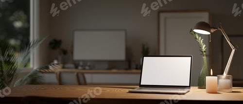 Preview: Minimal workspace with laptop mockup, candles, table lamp, and copy space on wood table