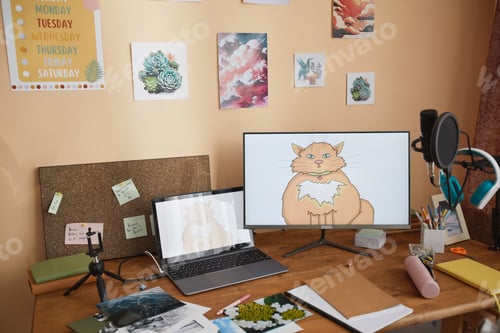 Preview: Kids desk with school supplies and digital art on computer screen