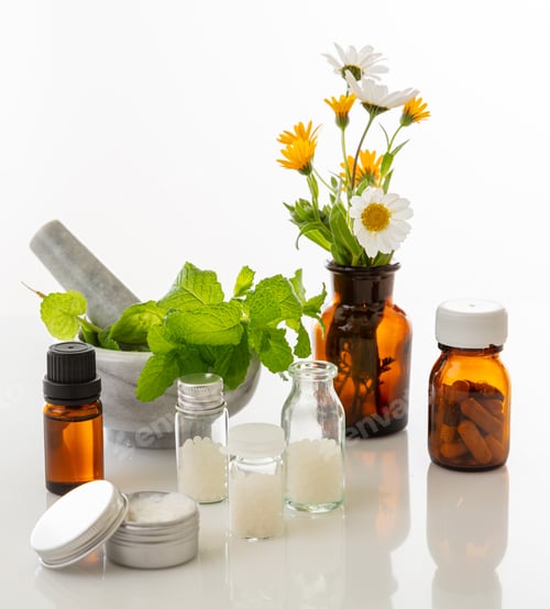 Preview: Wild flowers and herbs, mortar and pestle isolated on white background