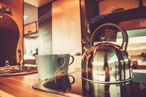 Preview: Kettle and Two Cups with Hot Tea Inside RV Camper Van
