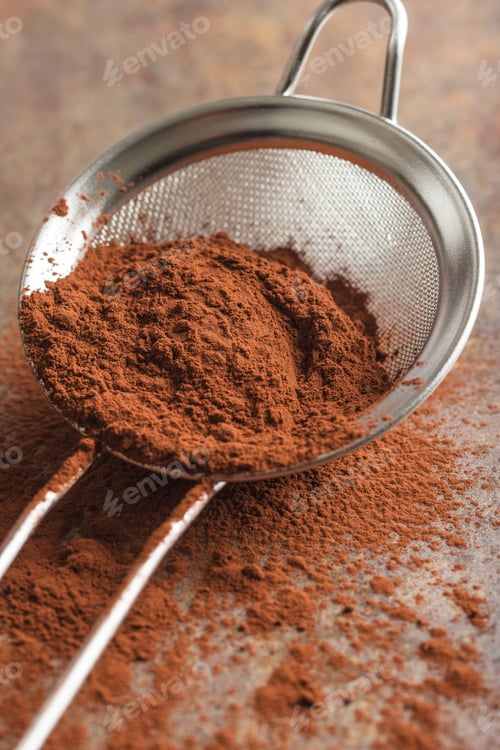 Preview: Cocoa powder in a sieve.