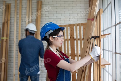 Preview: Carpenter working in carpentry shop. Carpenter working to making wood furniture in wood workshop