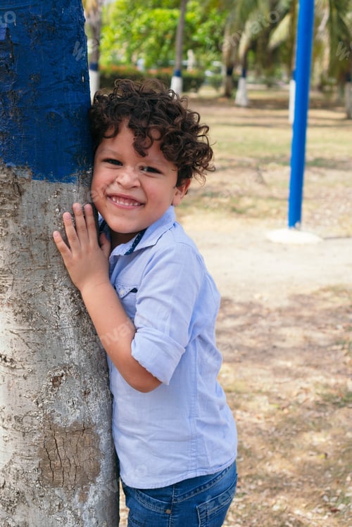 Preview: Hispanic child having fun in the park