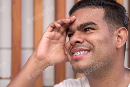 Preview: Portrait of a Smiling Man with Braces