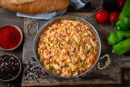 Preview: Turkish traditional menemen dish made with eggs, peppers and tomatoes