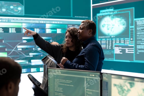 Preview: Governmental hackers analyzing cyber threats on big screens