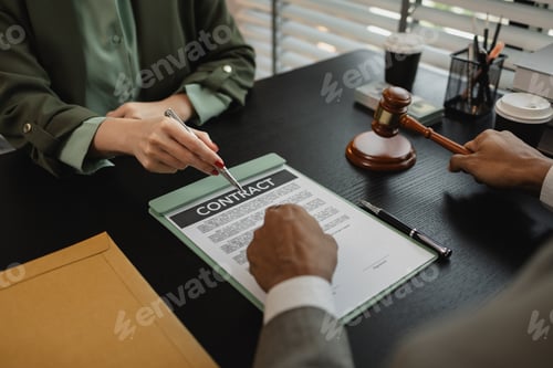 Preview: lawyers looking through client document together