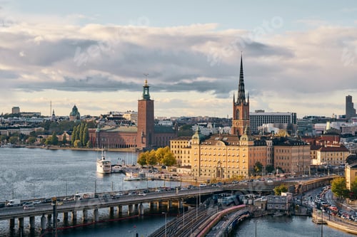 Preview: Bridges, railway tracks, church tower, cityscape and water canal, Stockholm, Sweden