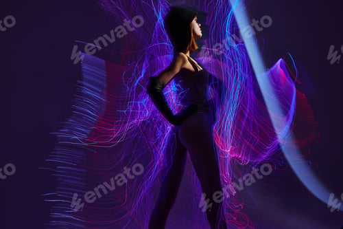 Preview: Beauty Fashion woman neon lines light posing studio model unaltered