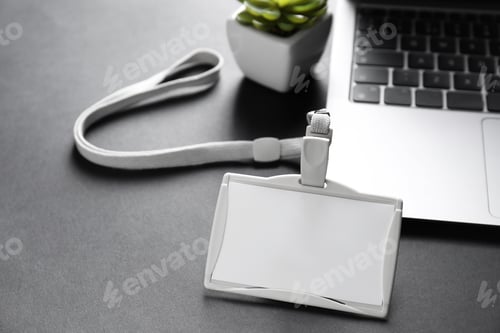 Preview: Blank badge, laptop and houseplant on grey background
