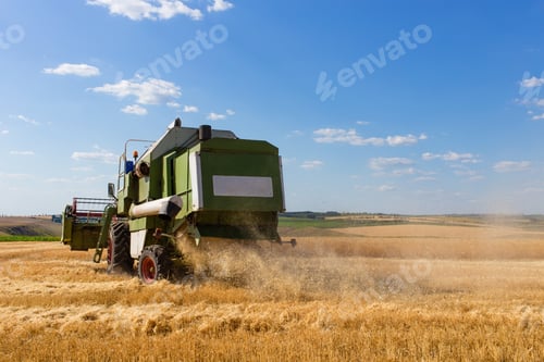 Preview: Combine harvester working on a wheat field.