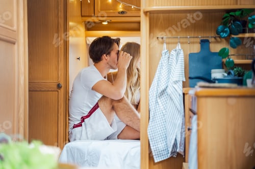 Preview: Young just married couple traveling in camper,house on wheels,trailer,motor home.Love romantic road