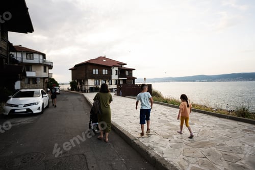 Preview: People walking on the embankment of Nessebar, Bulgaria.