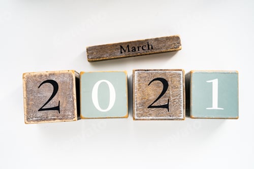 Preview: Numbers wood block cubes isolated on white background. 2021 March New Year abstract design concept