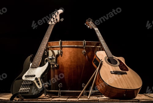 Preview: musical instruments, bass drum barrel acoustic guitar and bass guitar on a black background