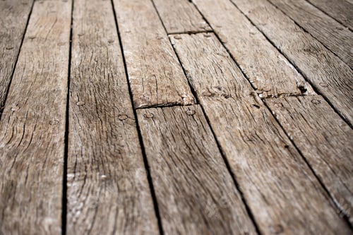 Preview: an old, wooden surface is covered in cracks and scratches