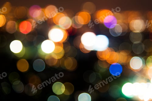 Preview: Blurred street bokeh lights at night time