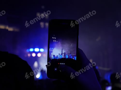 Preview: During a concert i saw someone taking a photo on a phone