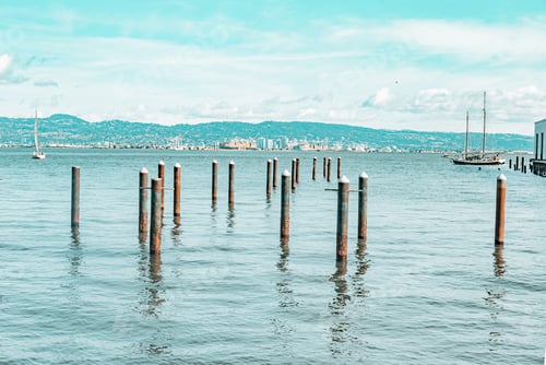 Preview: A body of water with a pier in the middle
