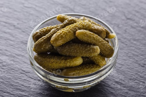 Preview: pickled vegetables on a dark stone background