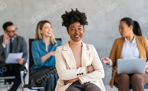 Preview: Successful businesswoman executive, leader discussing project management with diverse colleague