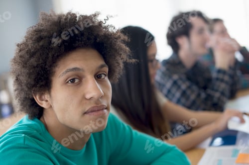 Preview: Student looking at camera, portrait