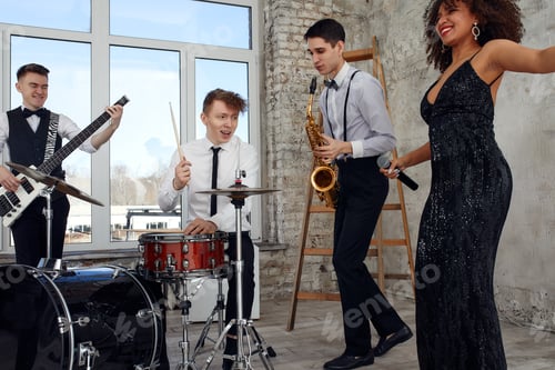 Preview: Young international musicians, a band performing on the loft stage. The concept of music, hobby