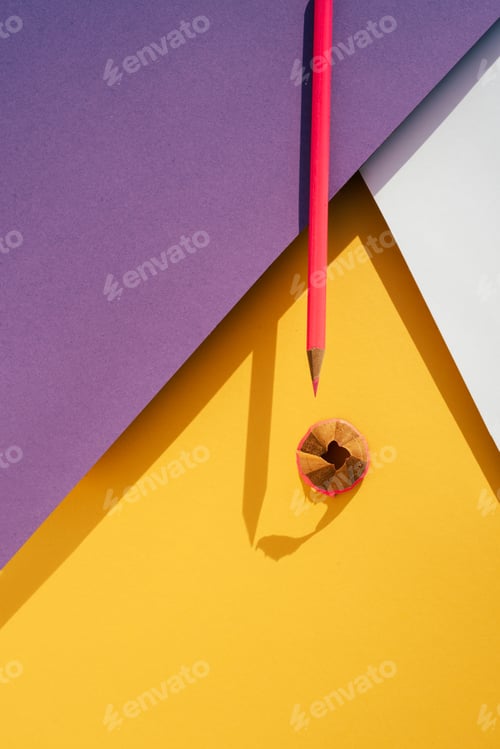Preview: Back to school: Pink pencil on geometric background