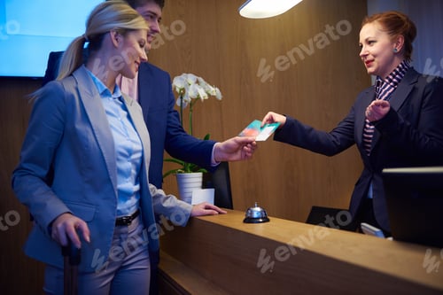 Preview: Couple On A Business Trip Doing Check-In At The Hotel