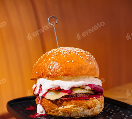 Preview: Gourmet burger on wooden background
