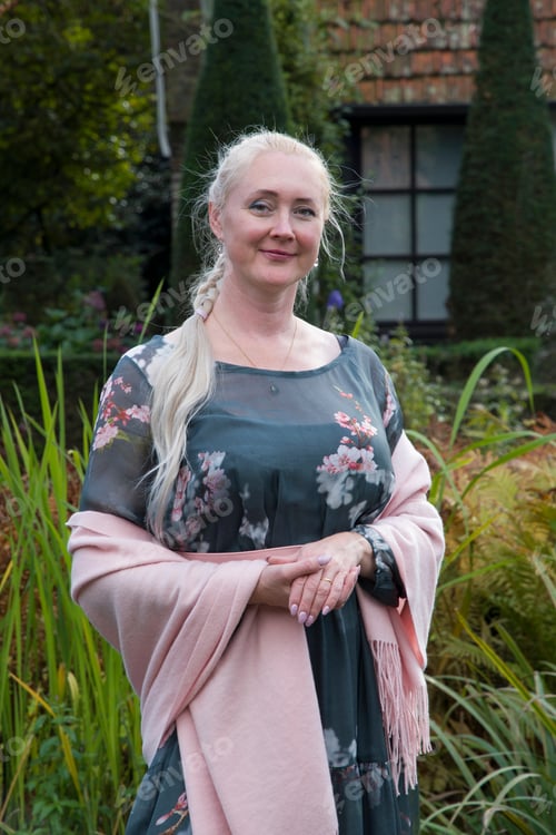 Preview: beautiful middle-aged woman with a long braid in stylish fashionable clothes, fashion style,
