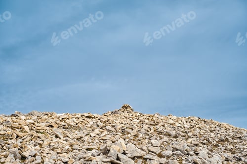Preview: Zen, balanced stones stacked in pyramid on stone run in high mountains against sky, Pirin Mountains