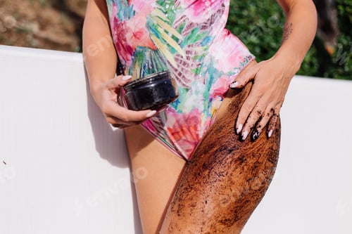 Preview: Outdoor shot of woman with coffee body scrub