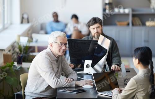 Preview: Modern Senior Man in Office