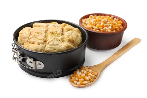 Preview: Freshly baked cornbread loaf and seeds isolated on white