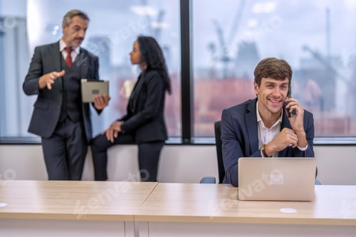 Preview: Staff employee sitting use mobile phone call in work place
