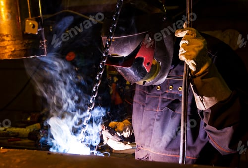 Preview: welder hard job with a hot metall