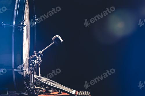 Preview: Bass drum with pedal, musical instrument on black background.