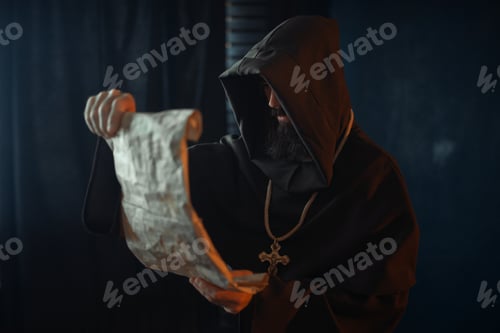 Preview: Medieval monk with an evil face reads a prayer