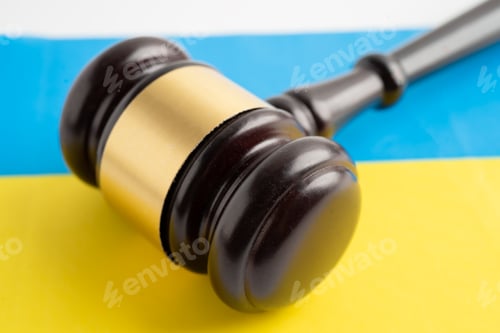 Preview: EU for judge lawyer and US dollar banknotes on Ukraine flag, finance concept.